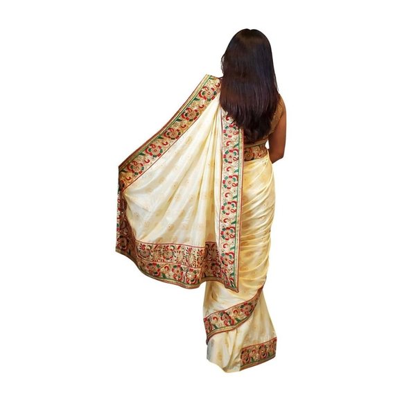 Cream colored brocade soft saree with embroidered border - Picture 3 of 3